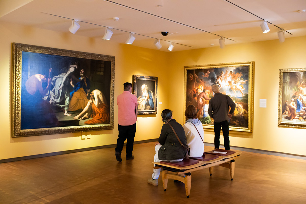 Group of adults enjoying the permanent collection