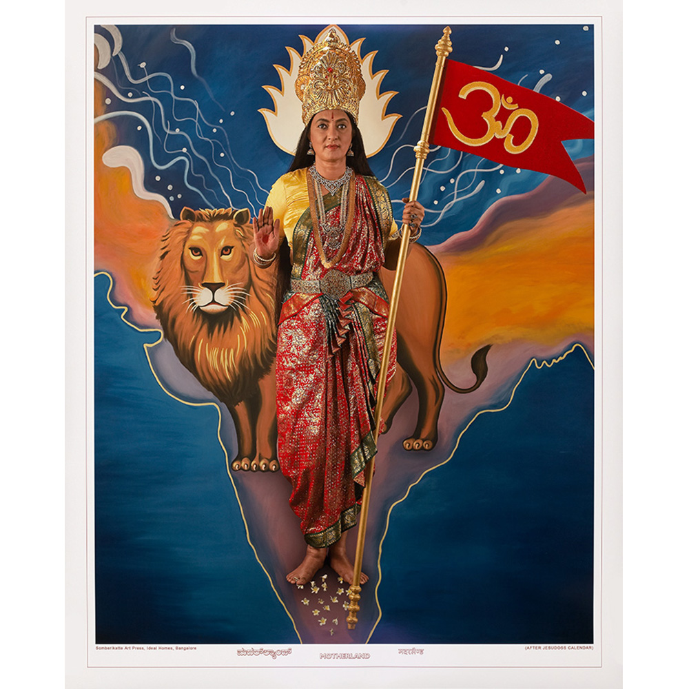 Photograph of woman with a lion holding a red flag with om symbol. 