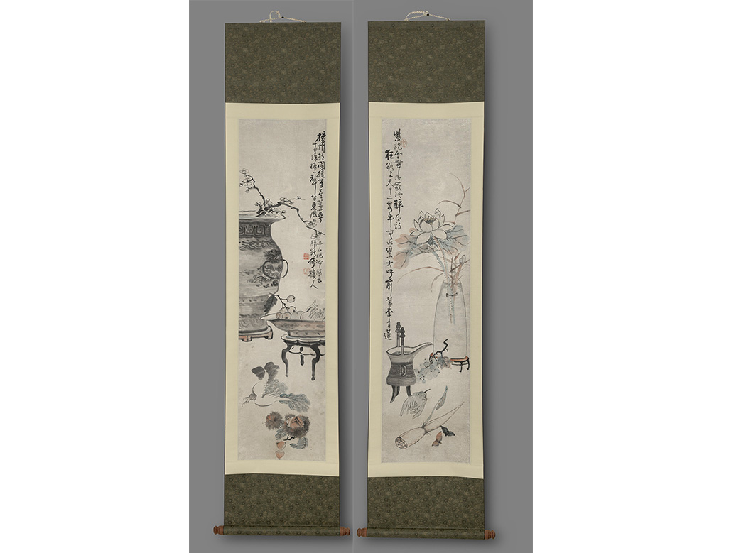 Two hanging scrolls side by side.