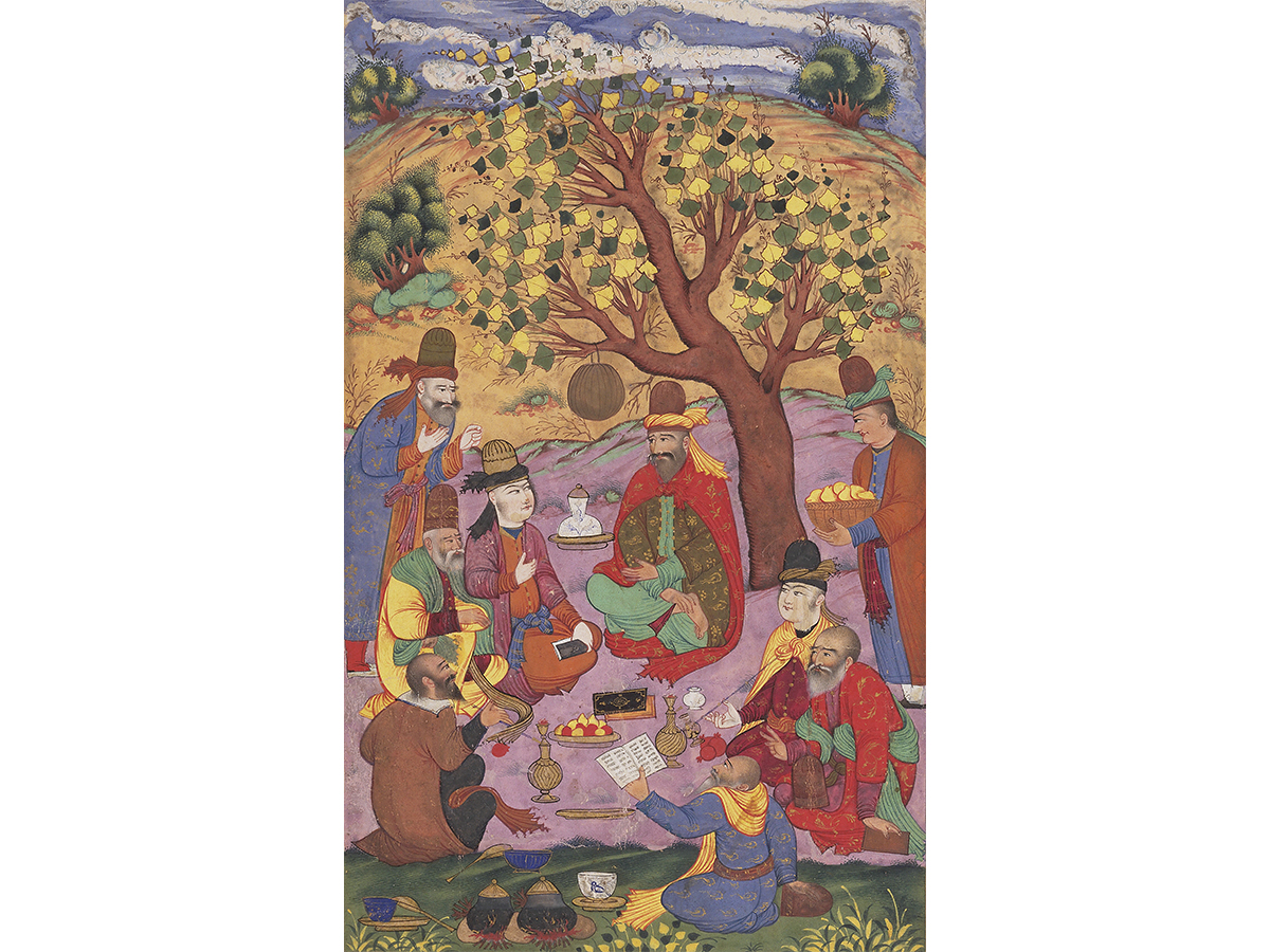 A colorful detailed painting of men dressed robes with hats sitting under a tree eating a meal together with one man reading
