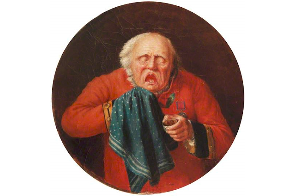 man with gray hair and beard in red uniform sneezing into blue handkerchief and holding a snuff box