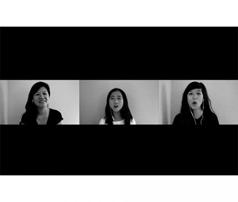three side-by-side screens appear with two sisters in black shirts, the artist on the right, her sister on the left, with the artist's young niece in a white shirt in the center, wearing white headphones against a light background; all three have long dark hair