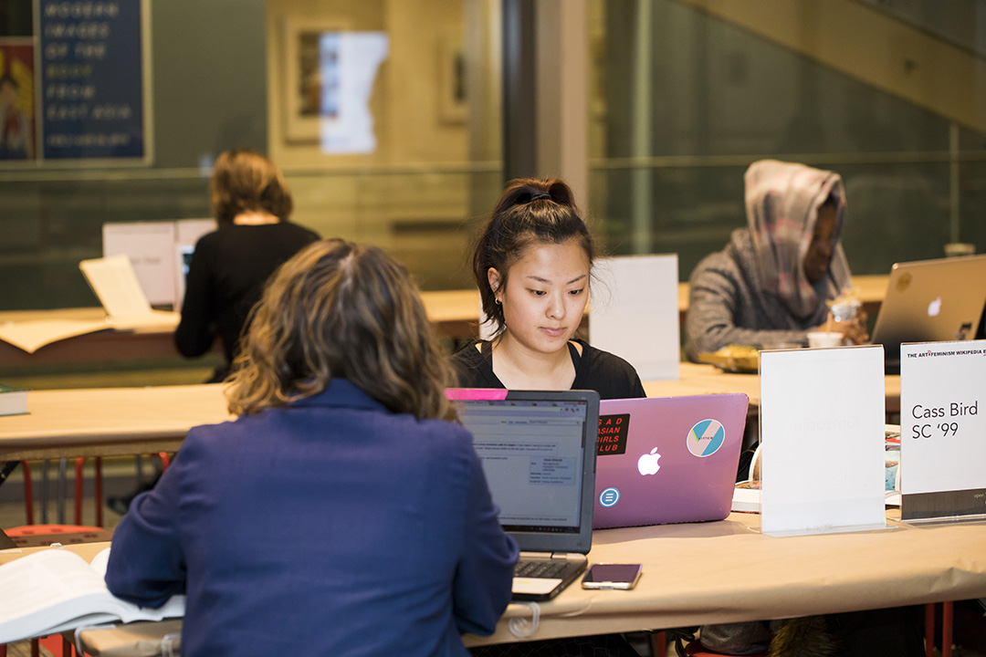 Students searching the collection during Art+Feminism Wikipedia Edit-a-thon