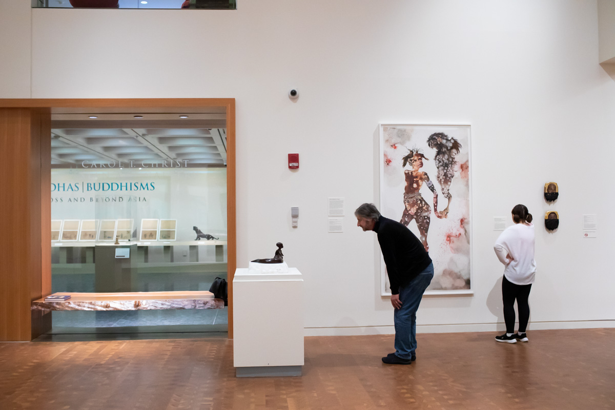 Visitors in the lower level gallery