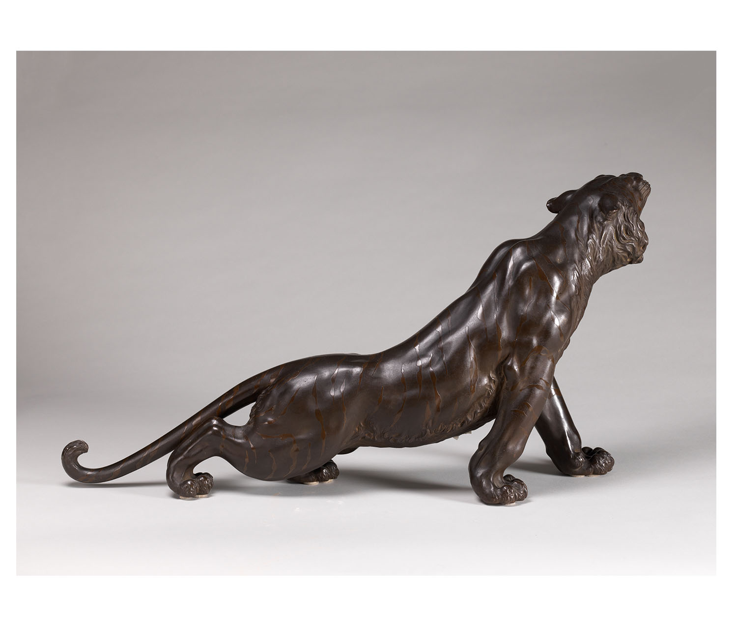 Okimono Tiger. by Atsuyoshi, produced by the Maruki company, 20th century, Japanese,  Bronze. Gift of Jane Hill Told’59 and William H. Told, Jr., SC 2016.39.4