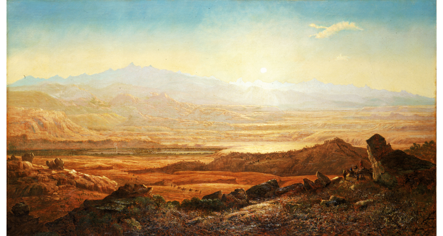 Desert mountain landscape; foreground of browns; midground of oranges, golds, and yellows; mountain horizon of golds, yellows, and blues. The sky is nearly cloudless.Groups of people – the size of ants – can be found in the valleys and mountainsides of the landscape.