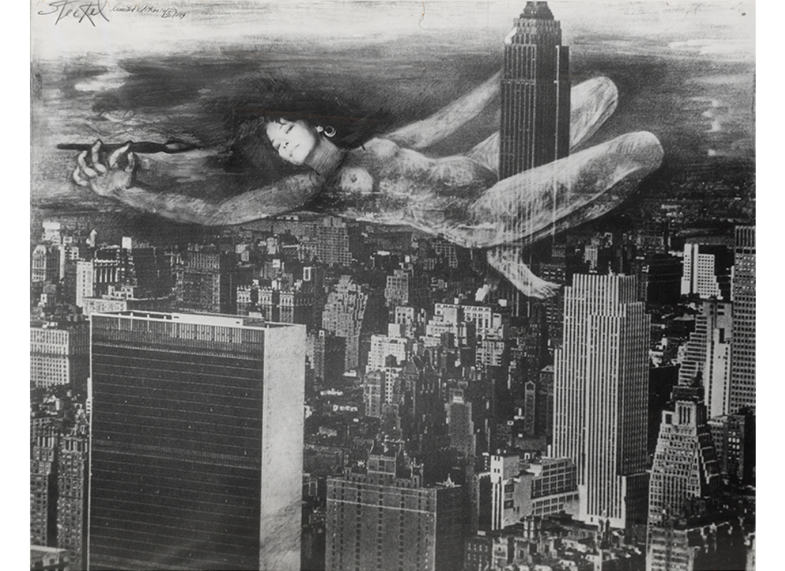 In a photographic gray landscape of Manhattan, a female figure, nude, straddles the Empire State building with an arm outstretched and holding a paintbrush.