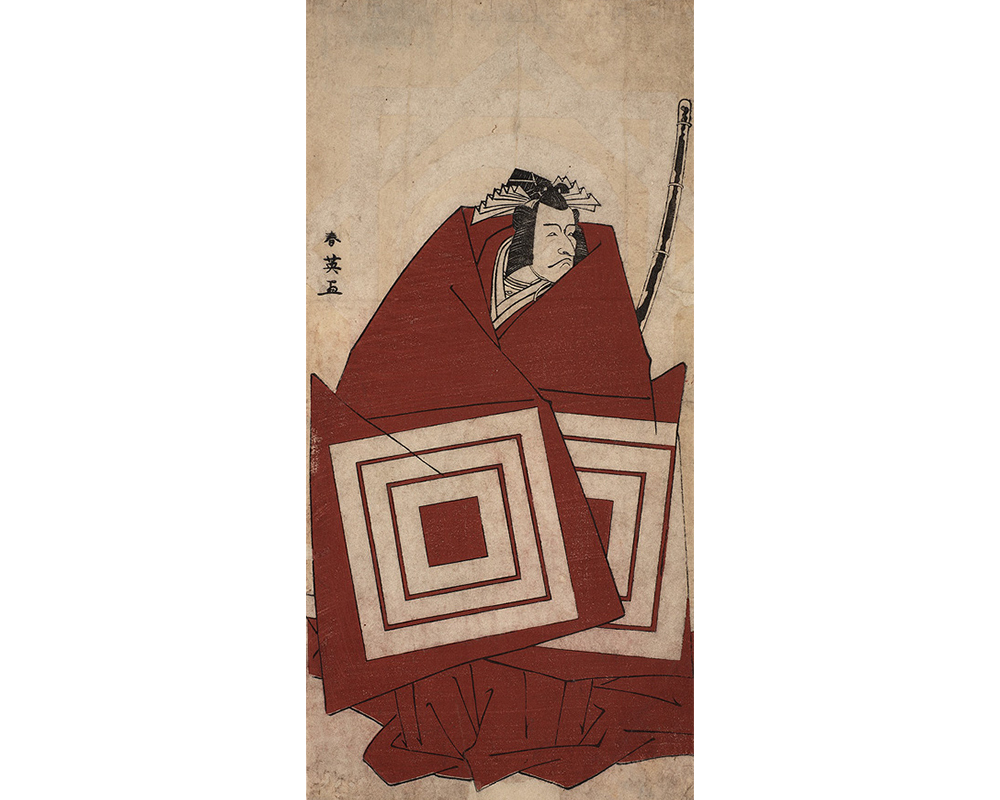 the actor Danjuro in a dramatic pose wearing a dark red robe, theater emblem on curtain behind actor