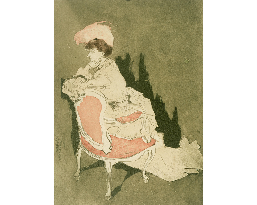 profile view of woman in fancy white gown and large pink hat kneeling on pink chair