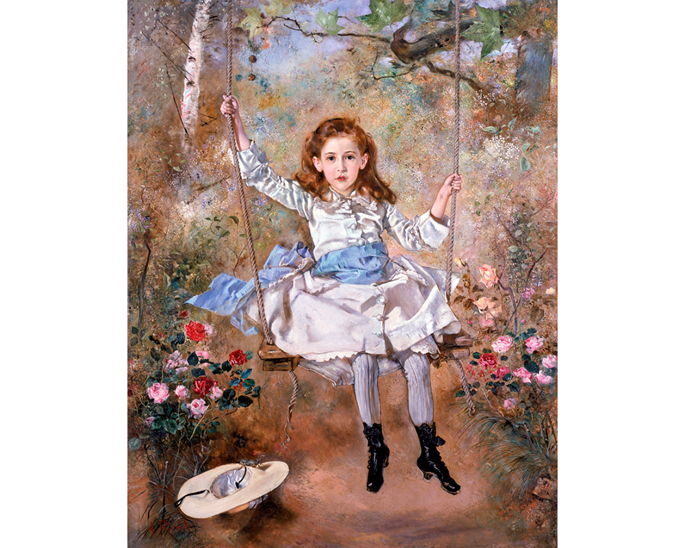 young girl in white dress sitting on a swing surrounded by flowers