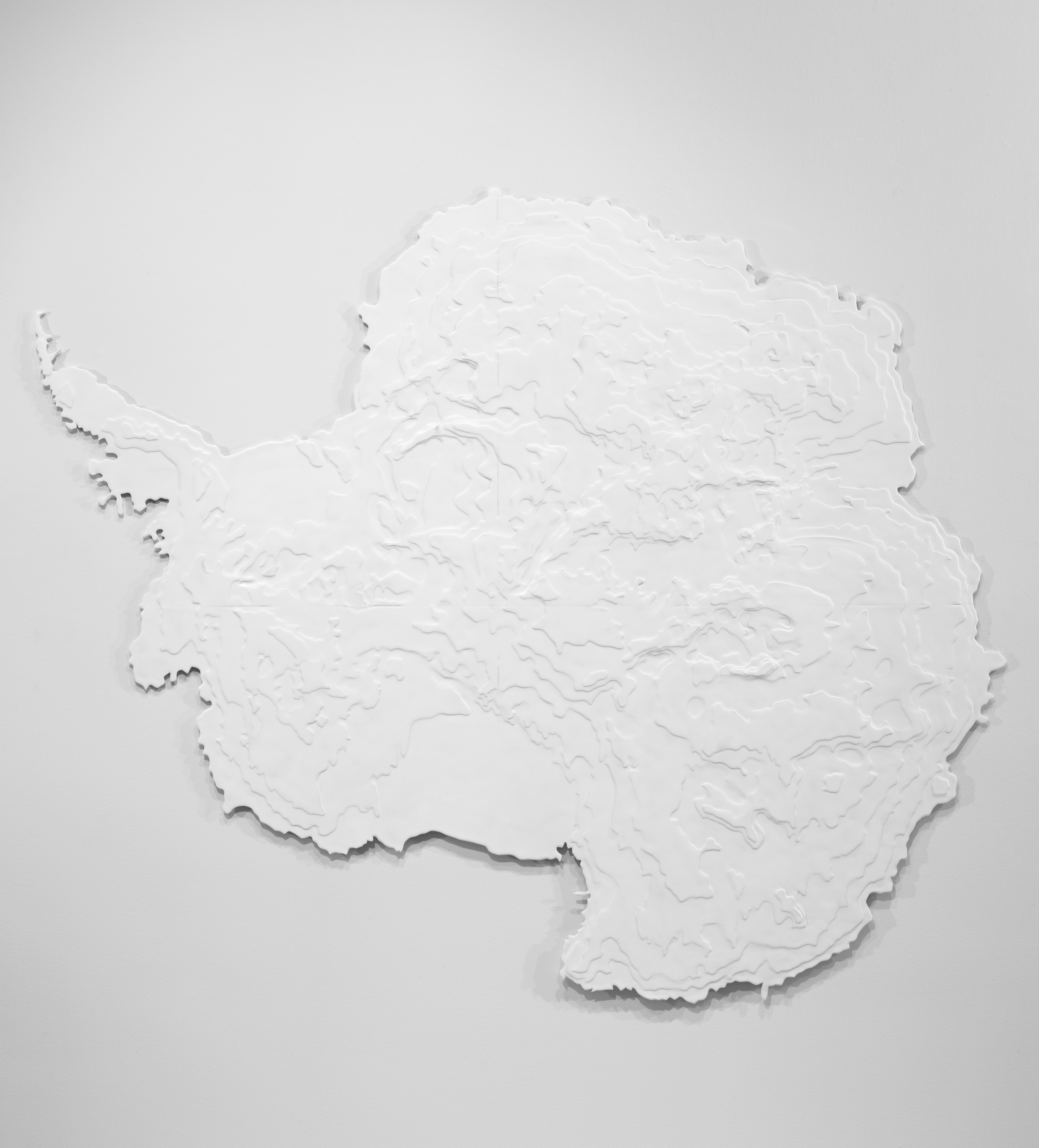White embossed shape of Antarctic
