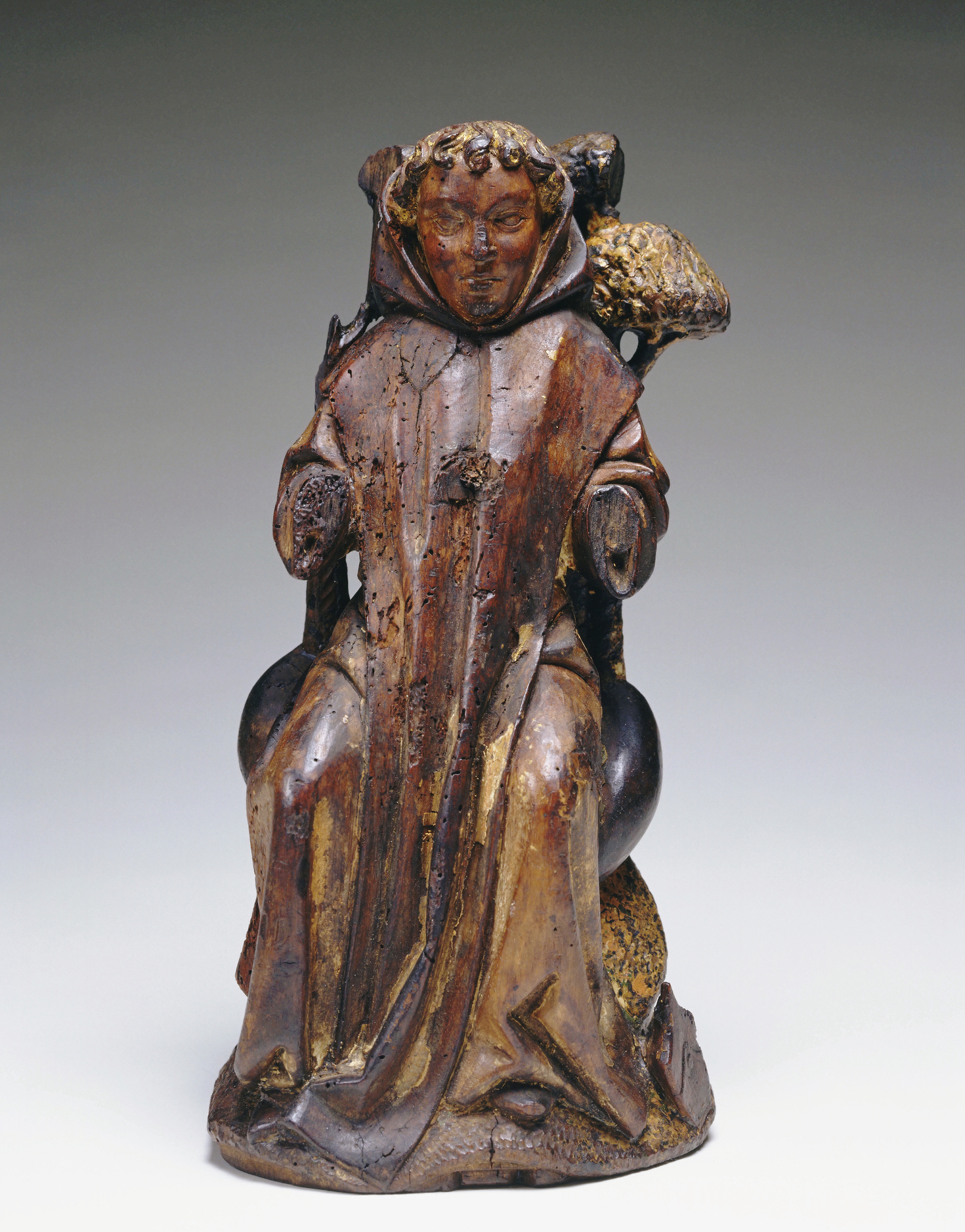 Walnut wood carved sculpture of a French Saint