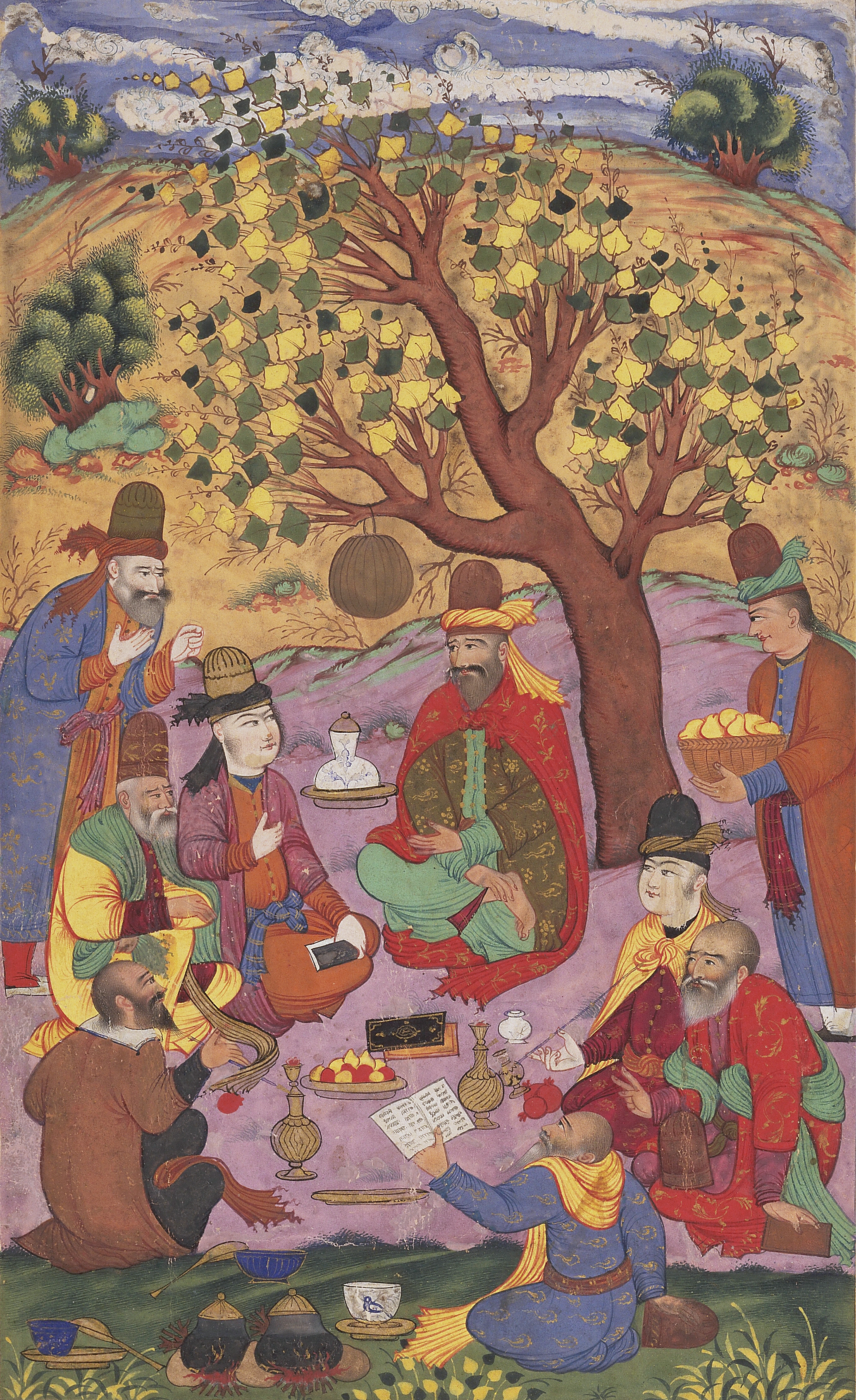 Colorful, detailed painting of 8 men dressed in robes and hats sitting beneath a tree, reading and eating a meal together
