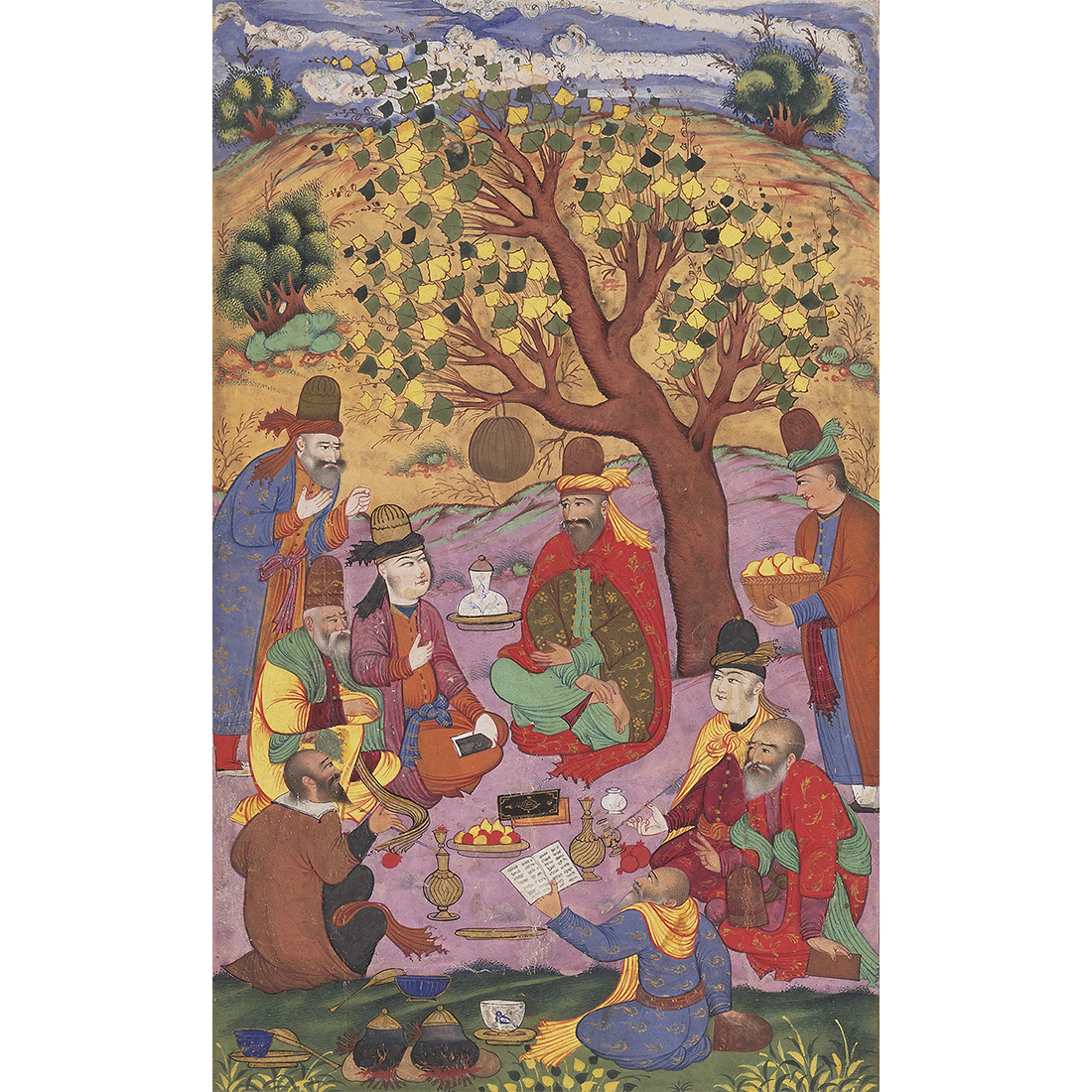Men in robes gathered beneath a tree eating and reading
