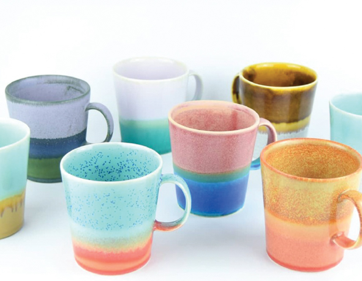  8 ceramics cups with stripes of many different colors