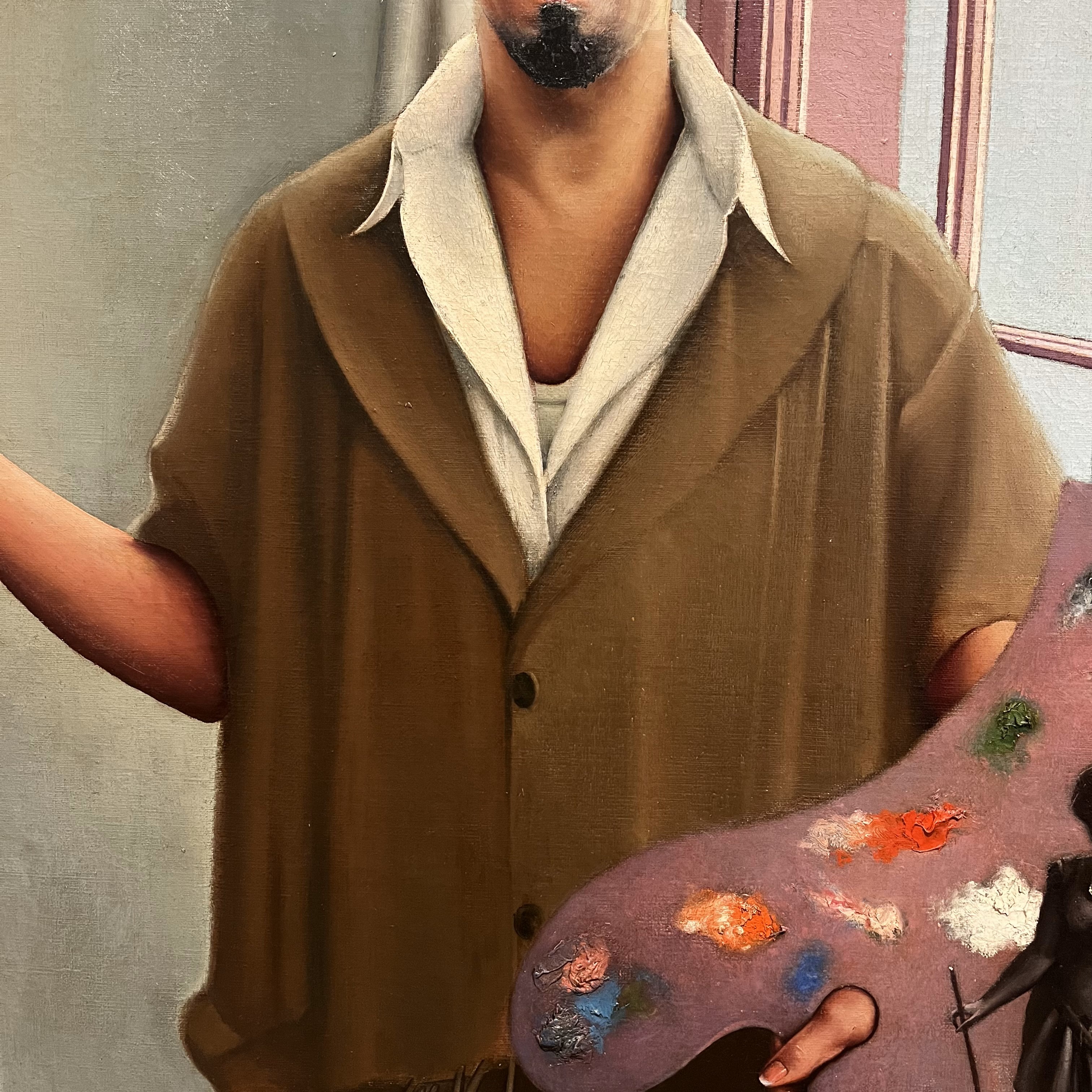 Archibald Motley's beige painters smock holding a painters palette