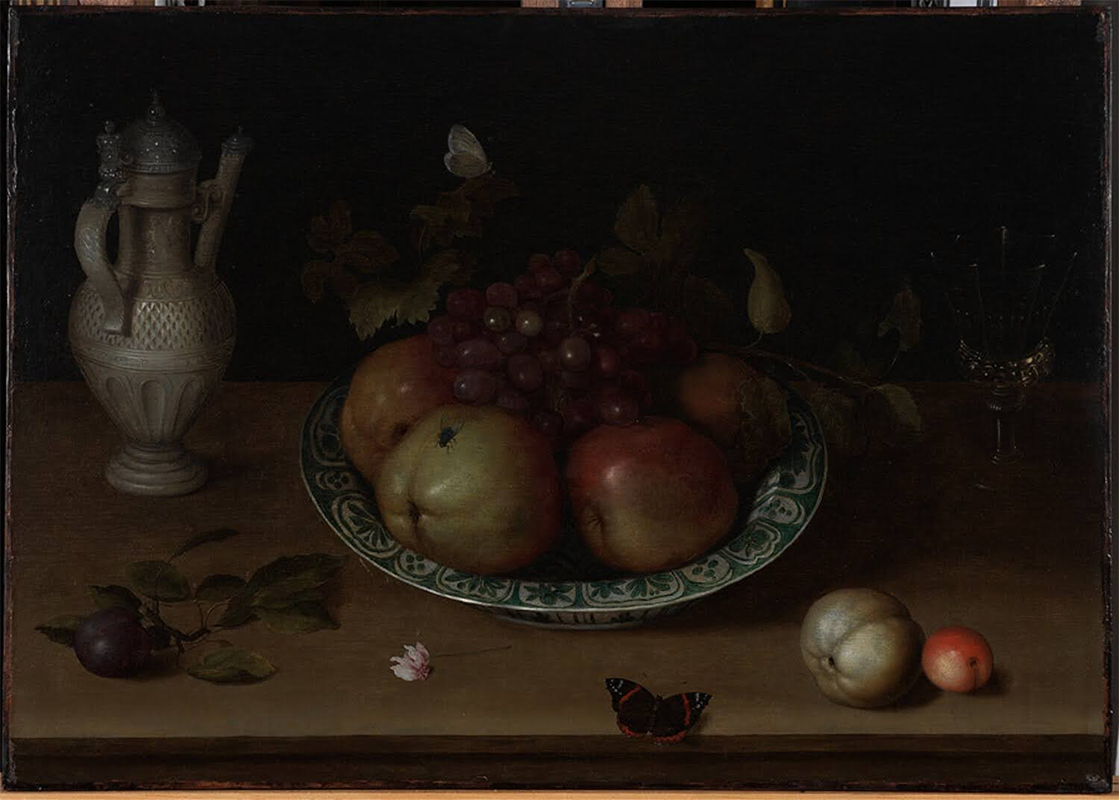 Still life painting of a blue and white porcelain dish of apples and other fruit.