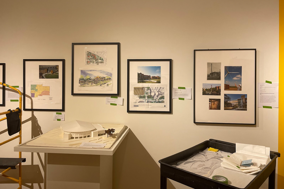 "Kamala GhaneaBassiri capturing the installation process for the history of campus planning at Carleton College exhibition at the Perlman Teaching Museum"