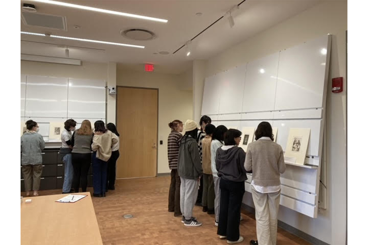 Students gathered in observation of Goya's prints