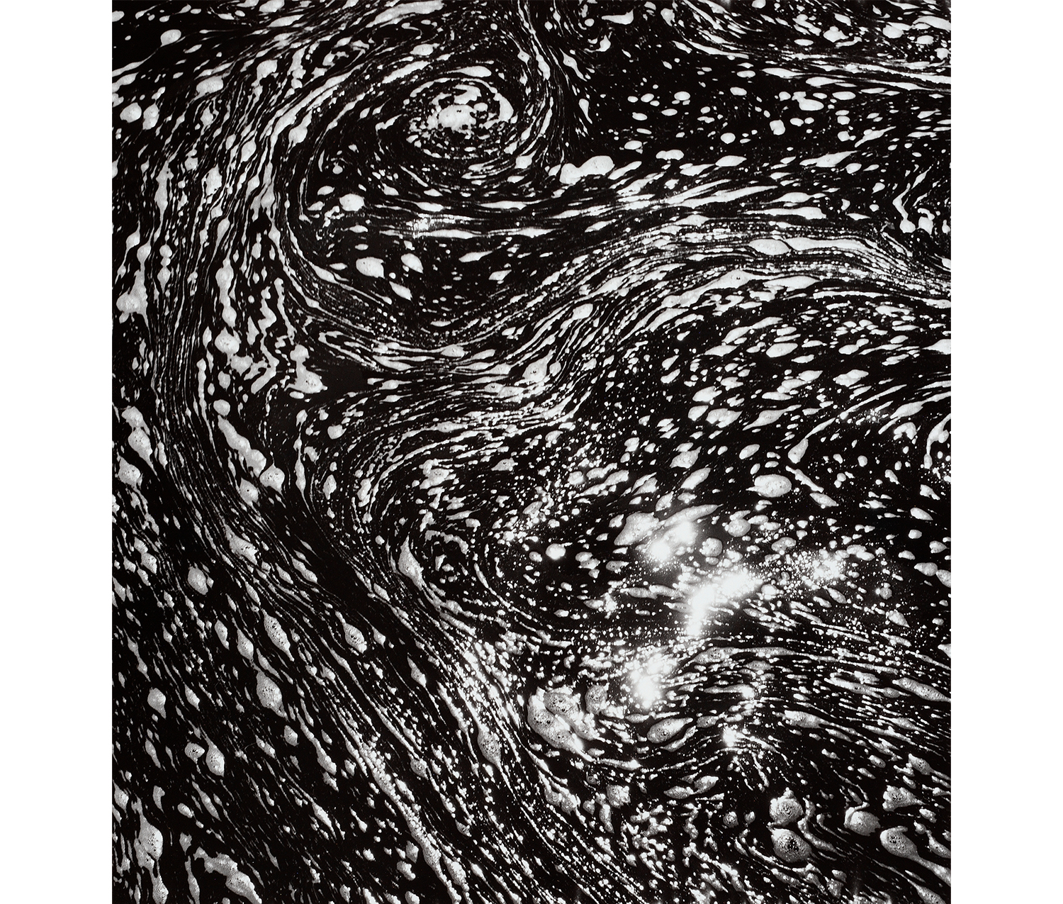 detail of water with swirls of bubbles