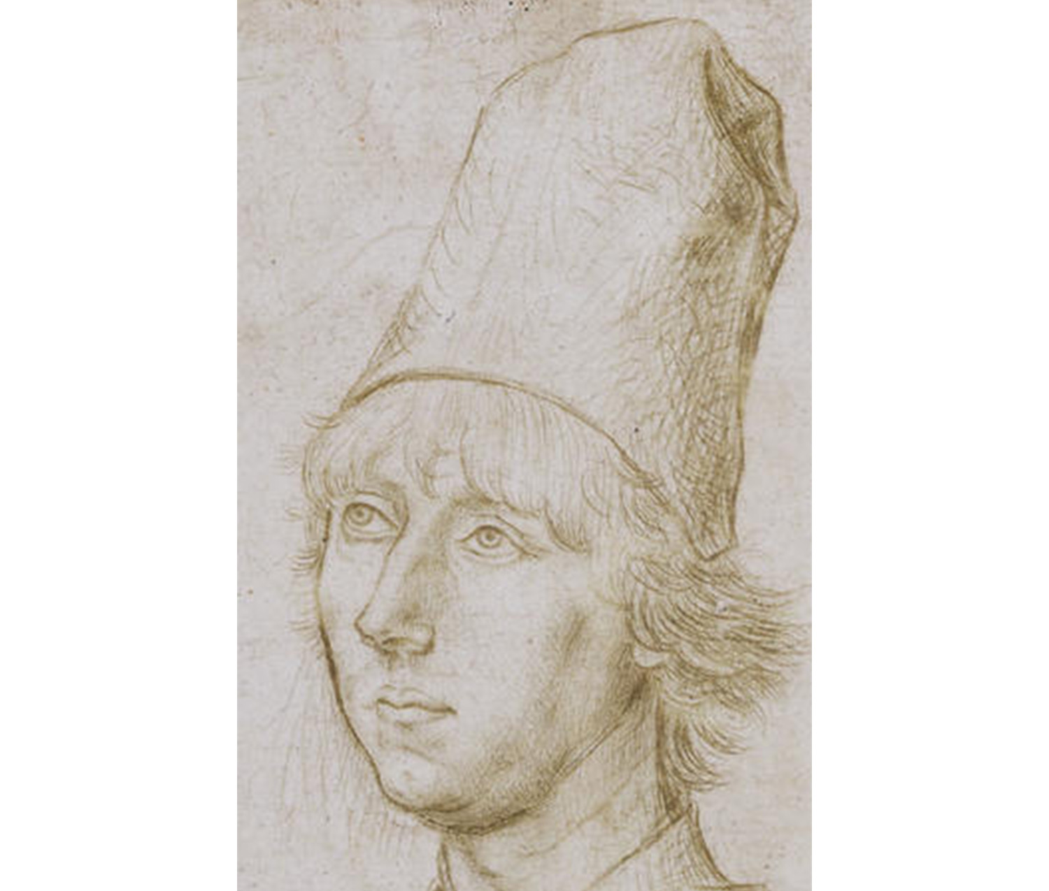 close-up of man in tall conical hat turned slightly toward his proper right