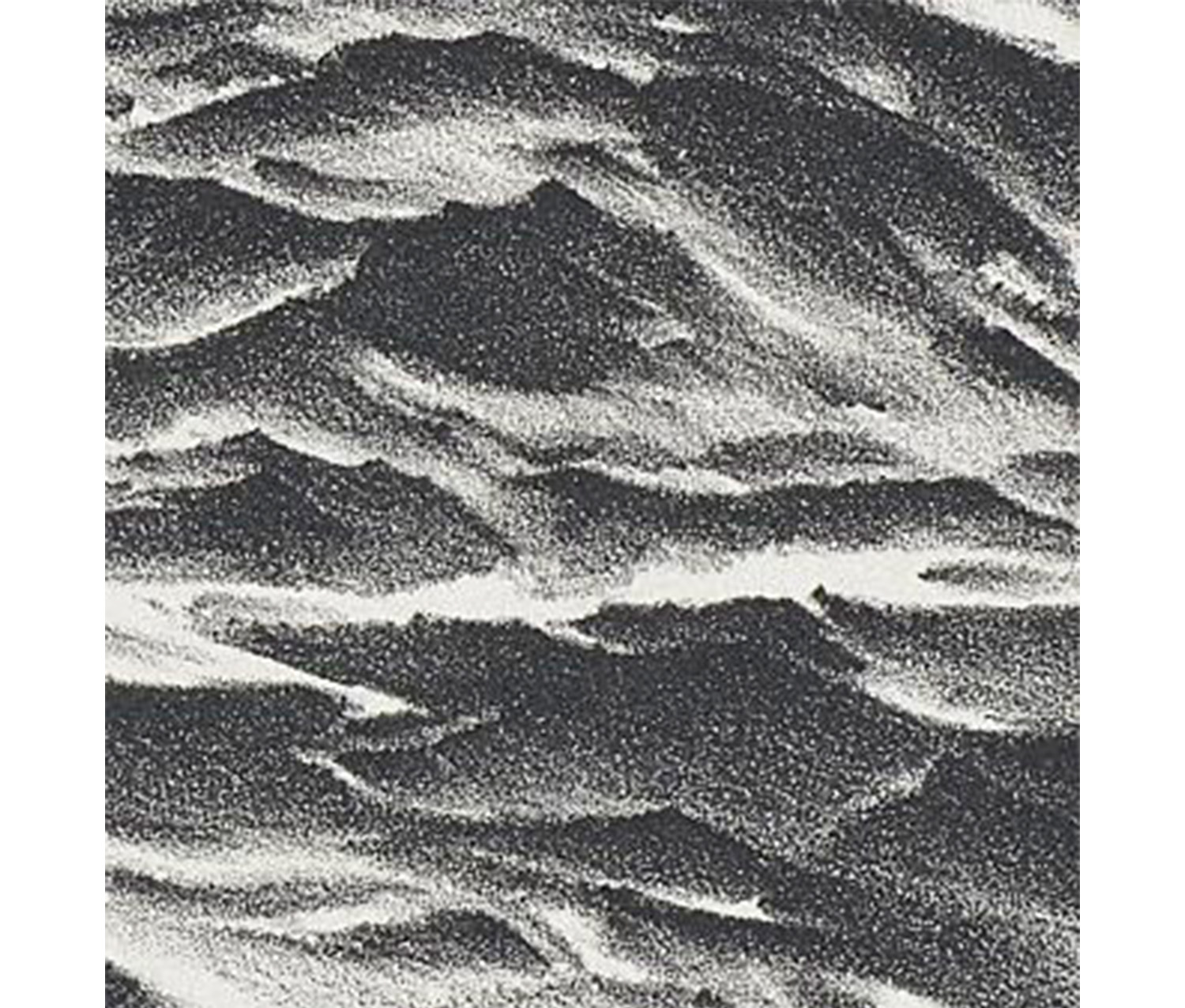 close up view of ocean waves in black and white