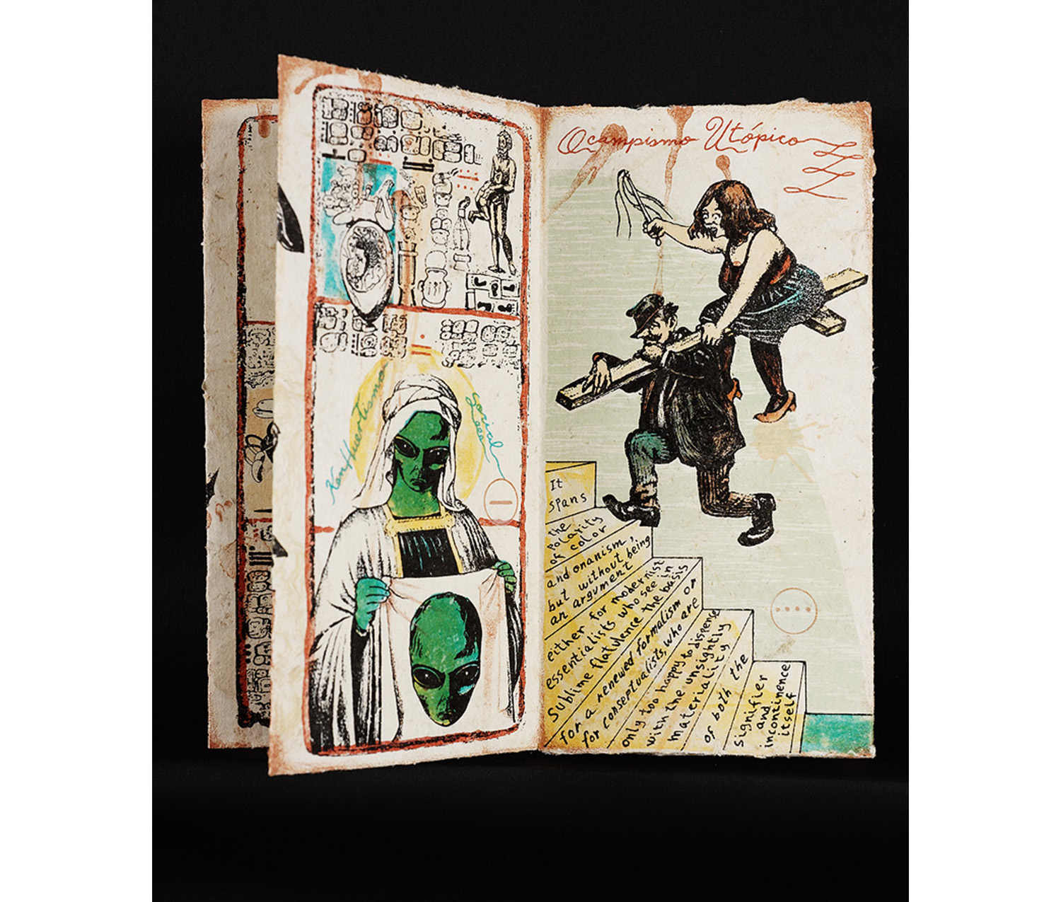 Open book. Left page: various drawings and symbols along the top; green alien wearing white robes and holding a piece of white fabric with its own face printed on it. Right page: man carrying a wooden cross over his shoulder, with a woman riding on it. The man balances on the edge of a set of yellow stairs with text written on them. 