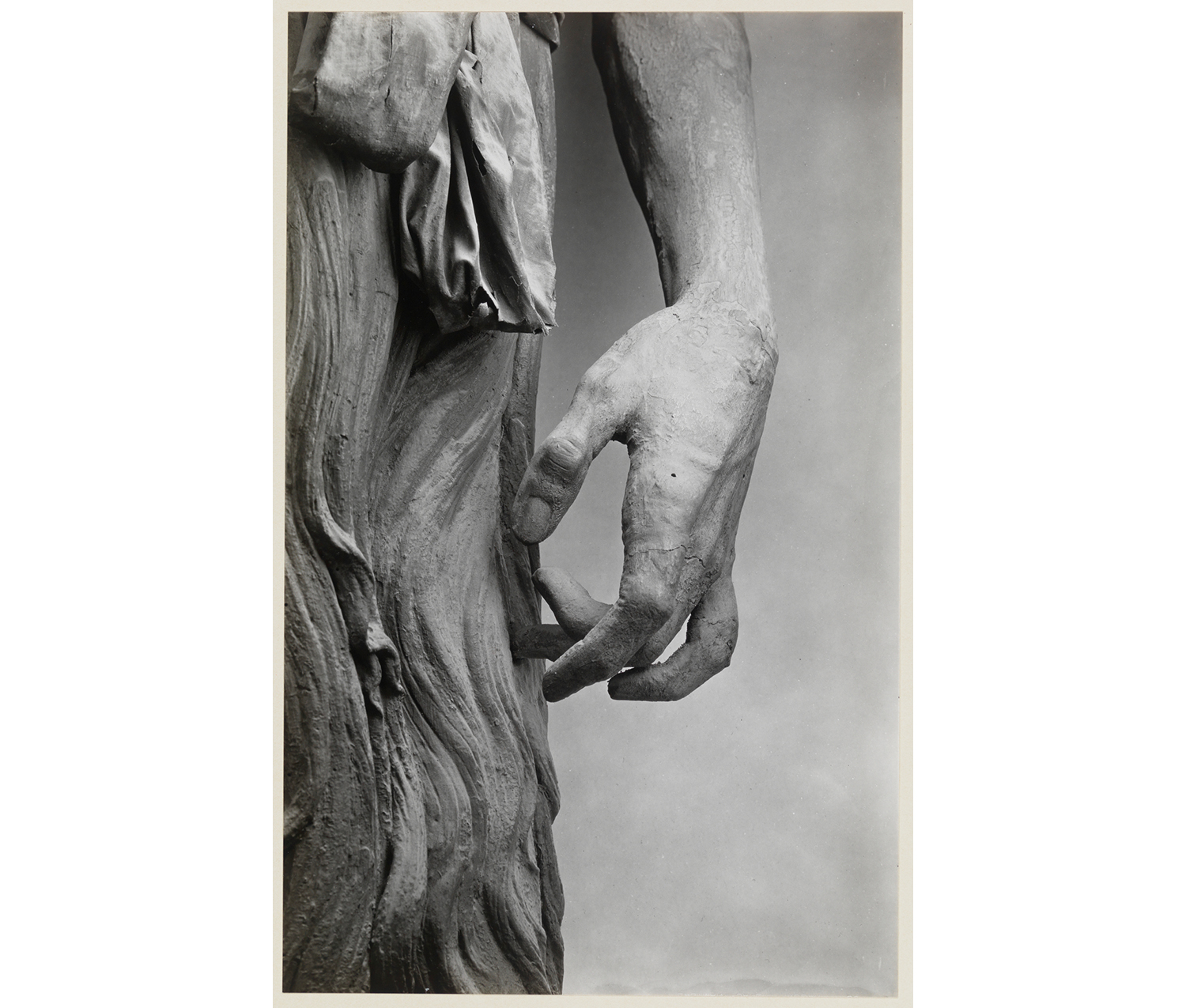 close-up of a hand of a sculpture with its fingers clenched slightly inwards