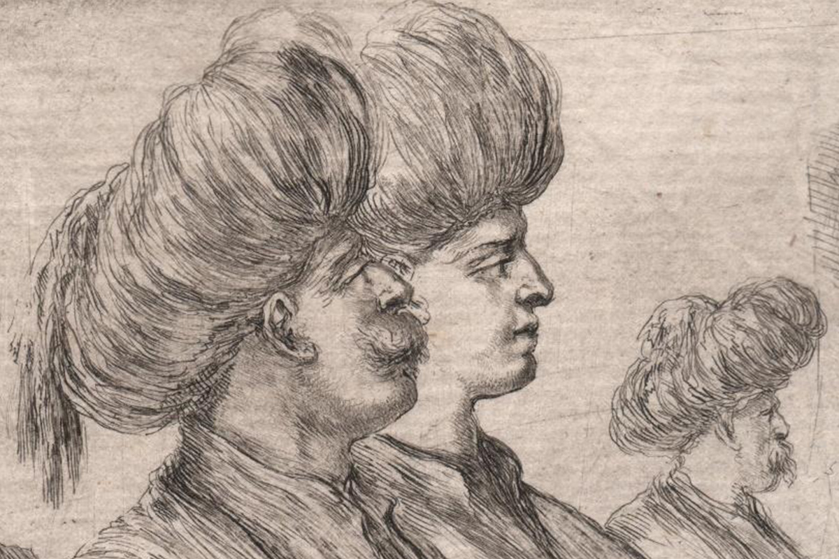 "Two men in turbans looking to the right"