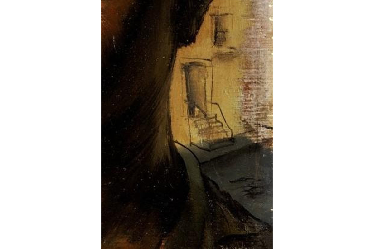 "close up of man's shoulder with apartment stoop in background"
