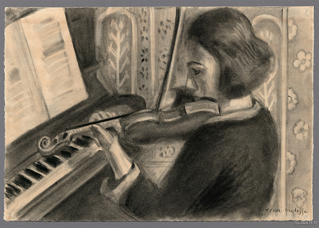 dark-haired woman facing left holding a violin and seated before a piano