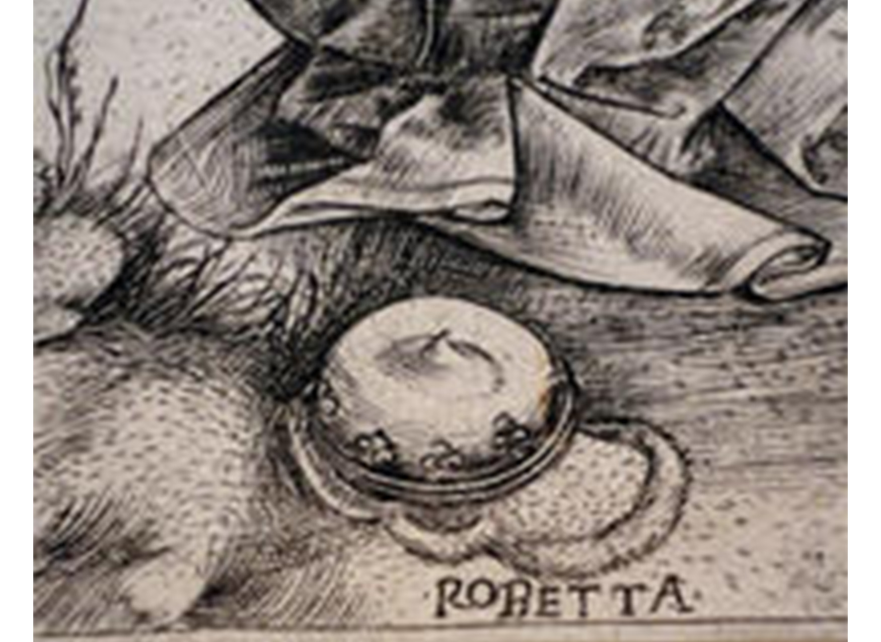 detail of hat sitting on the ground; text along bottom of the image reads "ROBETTA"