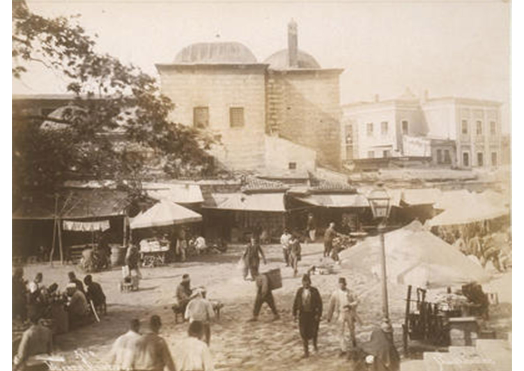 bazaar in the streets of Istanbul, with shops under tents and people walking around