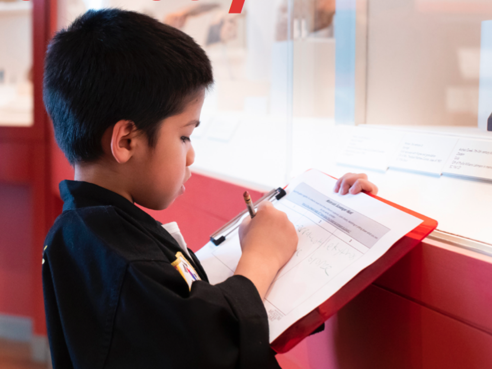Visitor studying the ancient collection