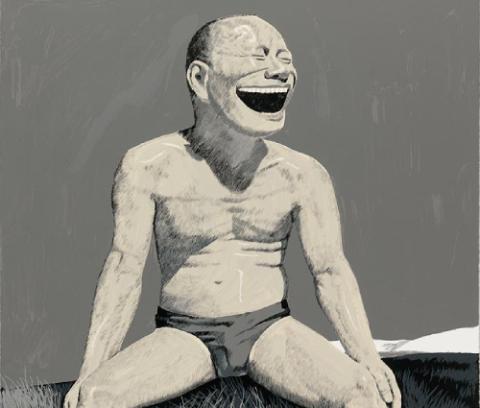 Widely grinning figure in bathing trunks sitting wide-legged on a grassy mound, low hills in background at mid-right, grey sky.