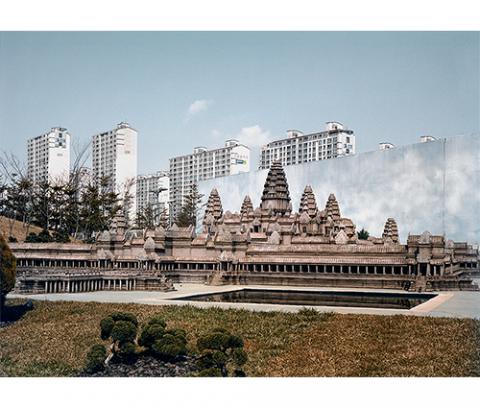 photographs of traditional Asian architecture against modern apartment buildings