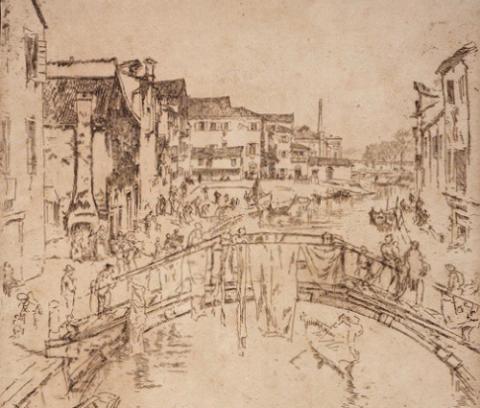 buildings in background connected by a bridge; boat with man in foreground rowing on a canal; Venice canal