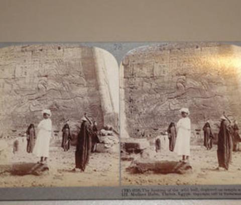 two identical images side by side of people standing in front of an Egyptian tomb