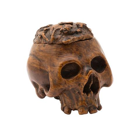 skull shaped box carved from wood