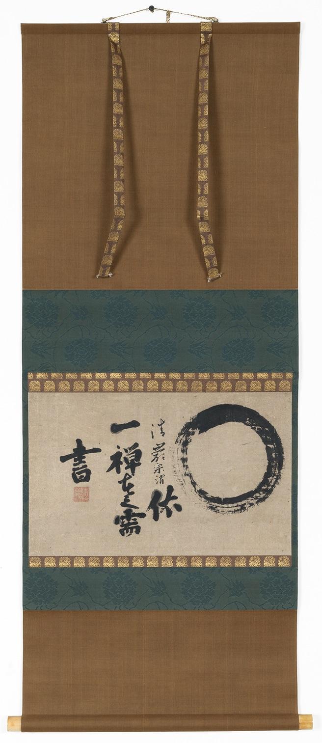 Hanging scroll with calligraphic Chinese letters and a big circle on the right
