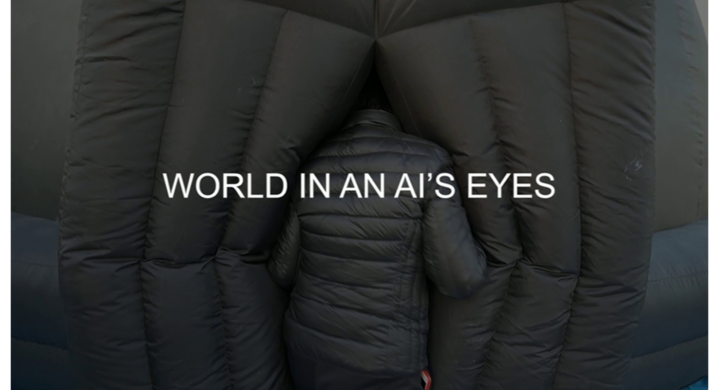 figure wearing black winter coat, seen from behind. white text on screen reads "WORLD IN AN AI'S EYES"